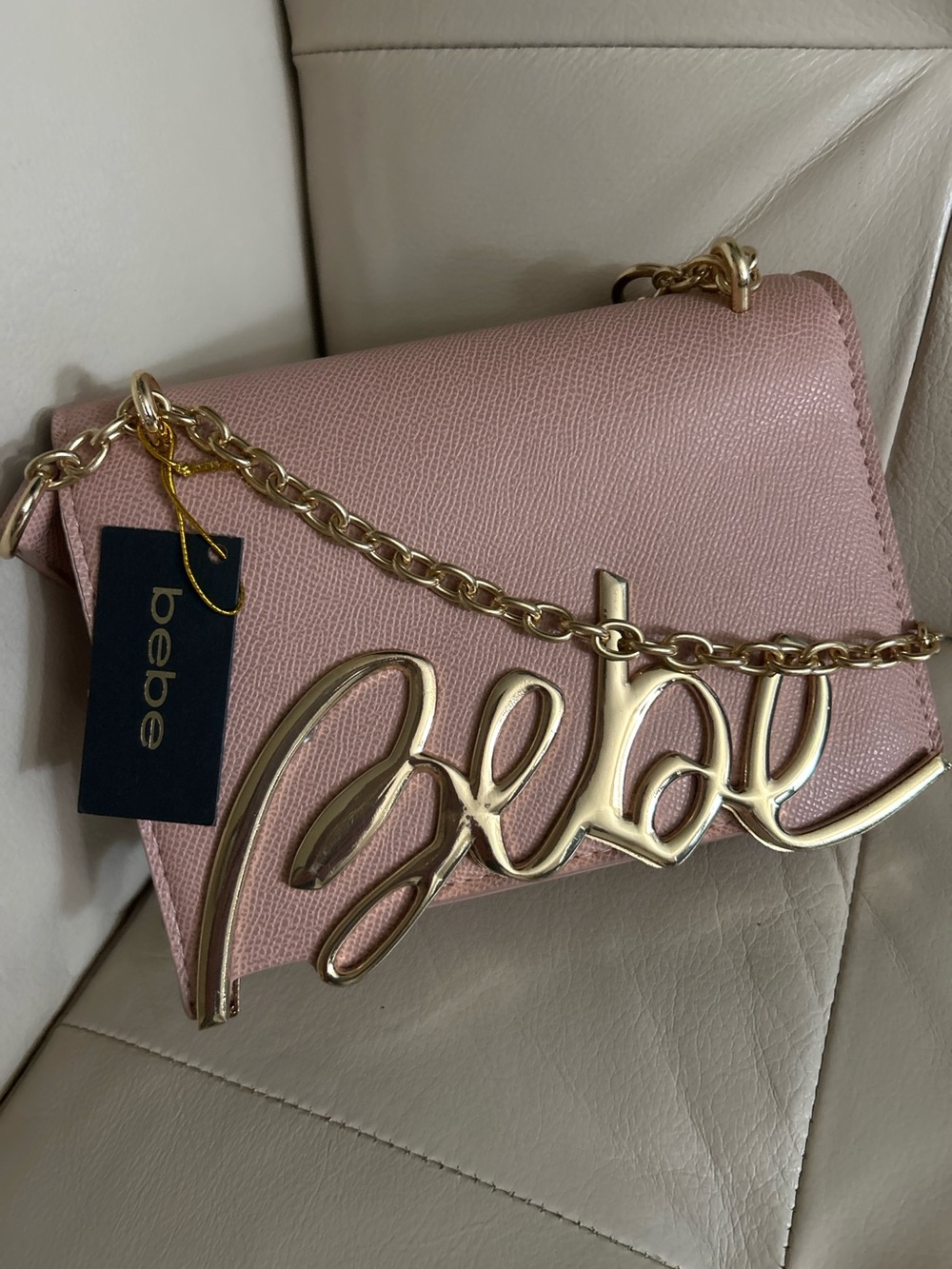 Bebe Blush Pink Crossbody Bag with Gold Chain Logo Accent